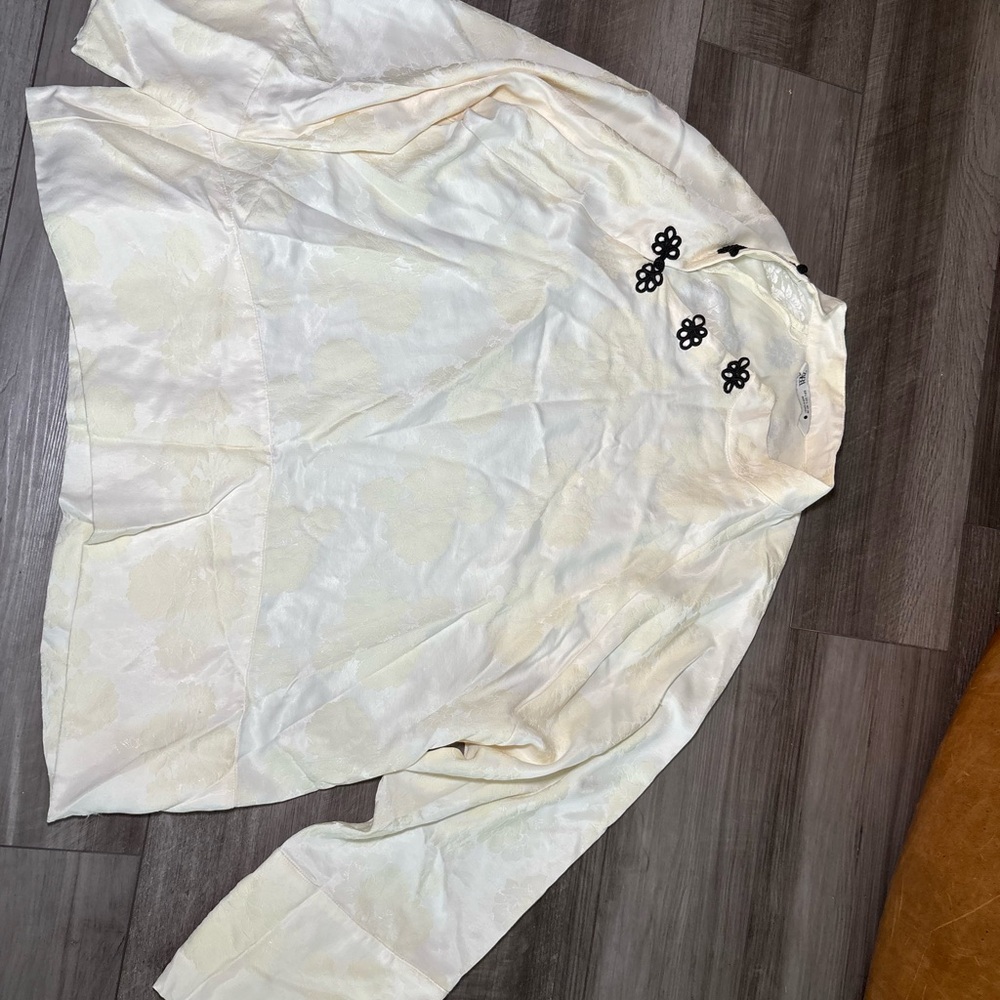Elegant Cream Blouse with Black Accents
